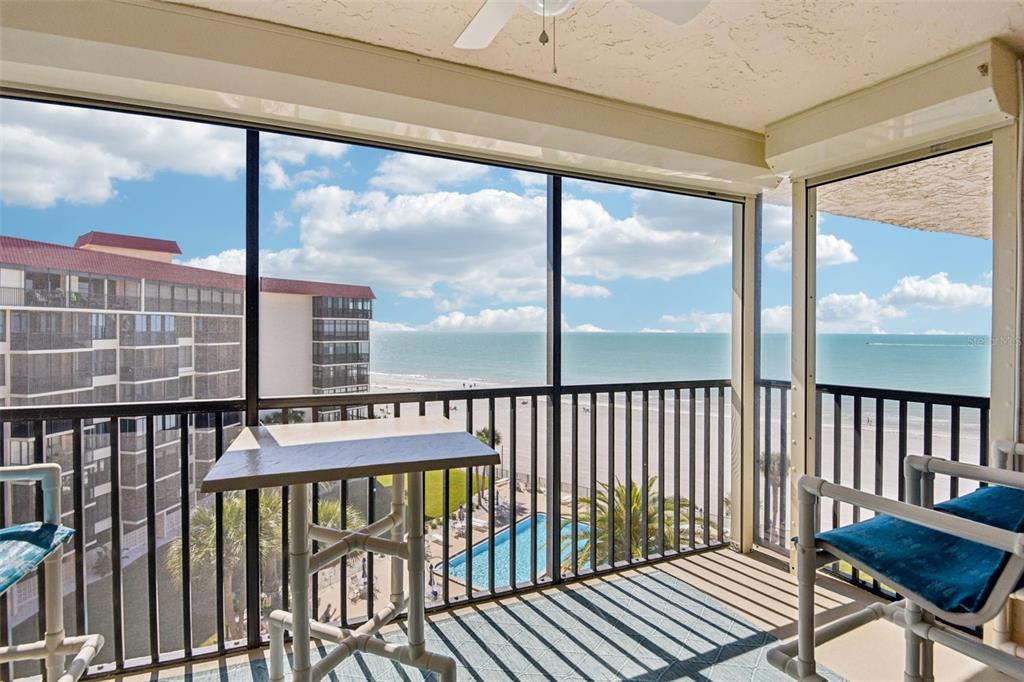 18304 Gulf Boulevard, Unit 607 Redington Shores, FL 33708 - Photo 1 of 30 a view of a balcony with furniture
