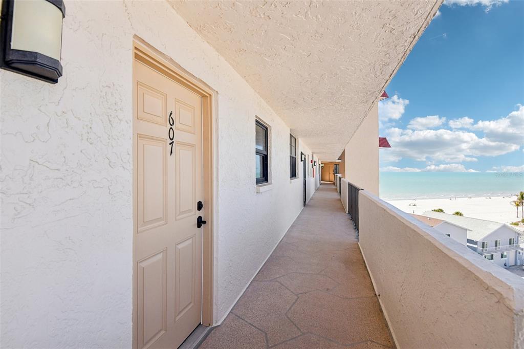 18304 Gulf Boulevard, Unit 607 Redington Shores, FL 33708 - Photo 3 of 30 a view of a hallway with an empty space