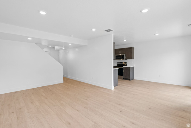1617 North Angel Street Layton, UT 84041 - Photo 17 of 43 Unfurnished living room with light wood-type flooring and recessed lighting