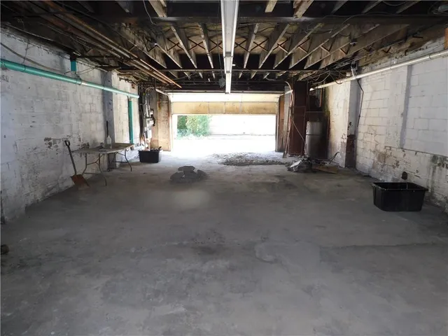 a view of empty room with windows