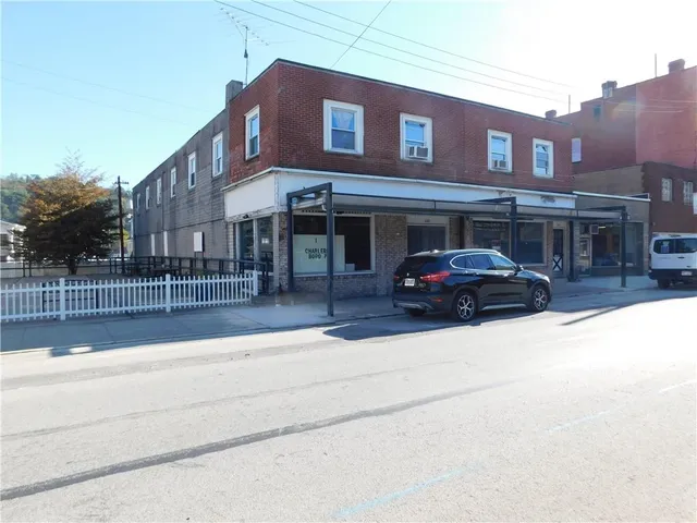 a car parked in front of a building