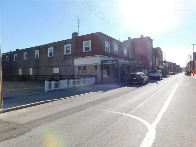 a view of a building with a street