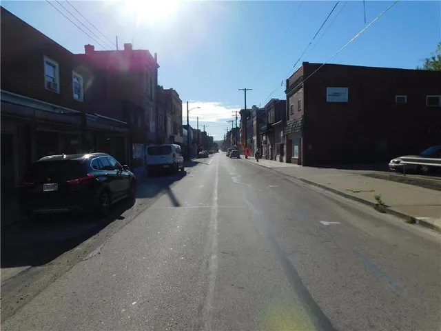 a car parked in front of a house