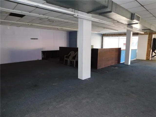 a view of a livingroom with furniture