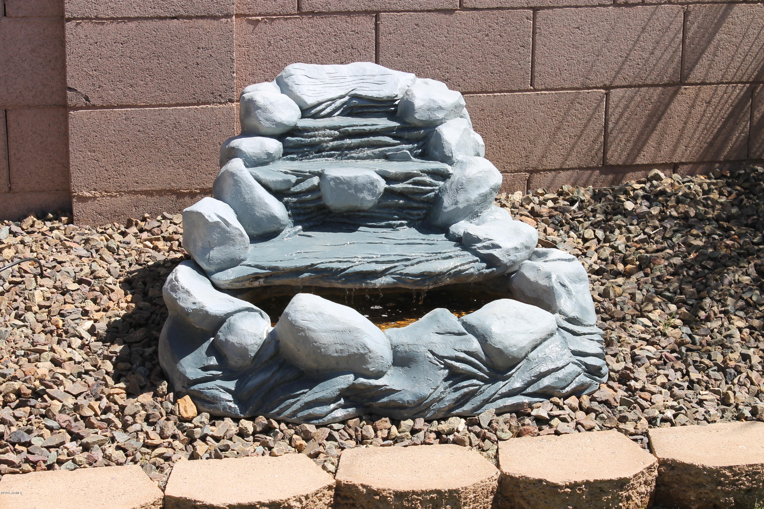15838 West Boca Raton Road Surprise, AZ 85379 - Photo 54 of 59 Fountain in Backyard