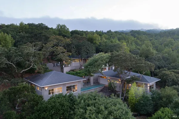 an aerial view of a house with a garden view