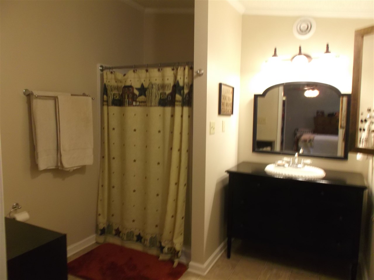 768 Patterson Mill Road Grottoes, VA 24441 - Photo 11 of 17 a bathroom with a sink and a mirror
