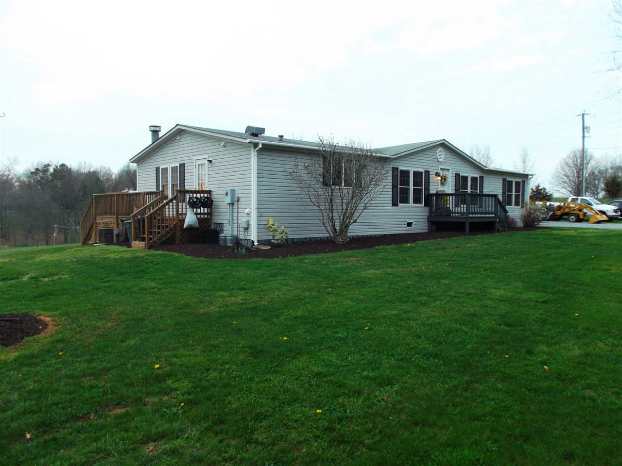 768 Patterson Mill Road Grottoes, VA 24441 - Photo 13 of 17 a front view of house with yard and green space