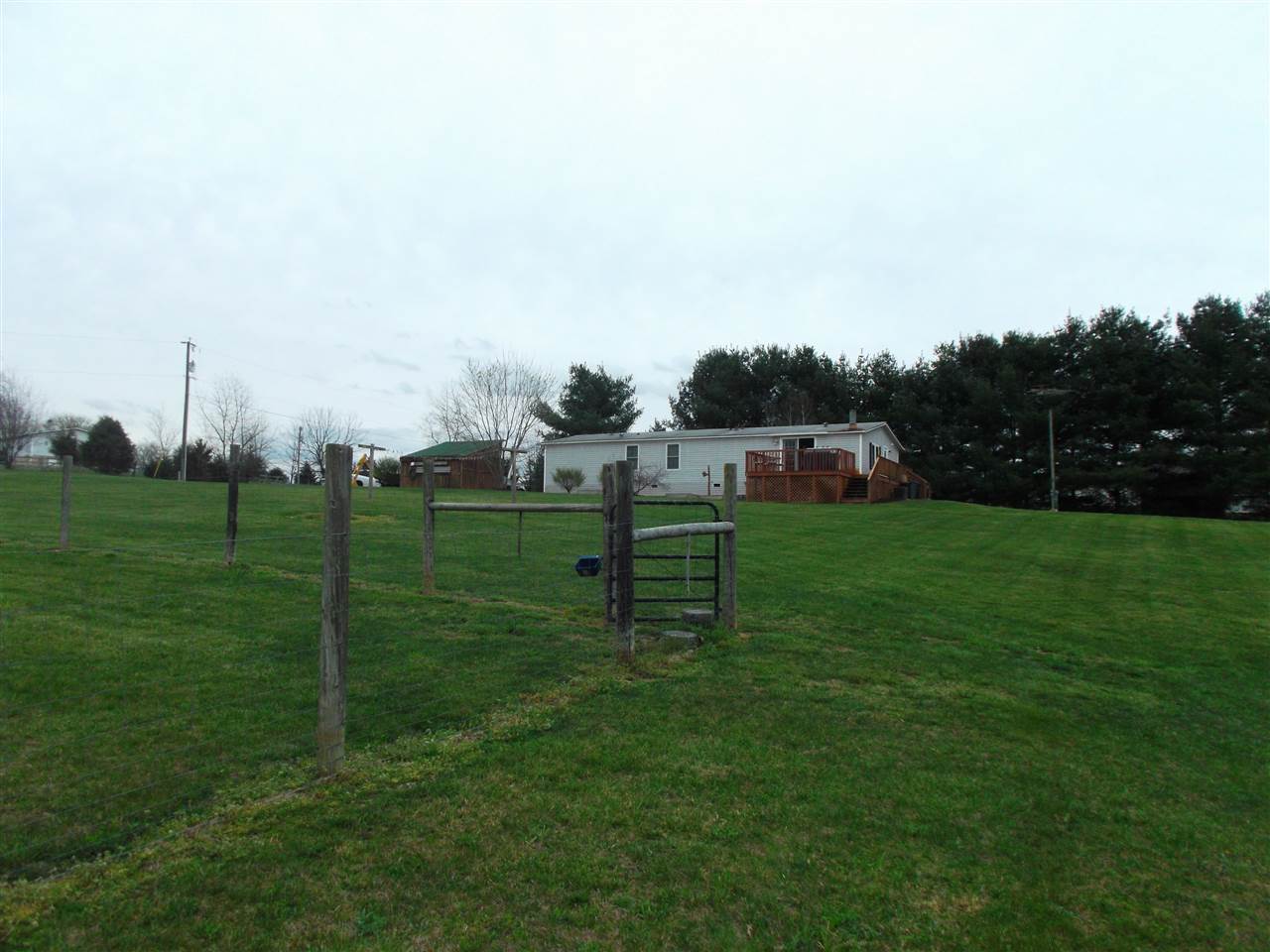 768 Patterson Mill Road Grottoes, VA 24441 - Photo 17 of 17 a view of a green field with wooden fence