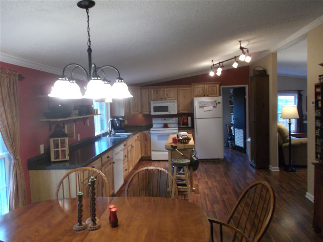 768 Patterson Mill Road Grottoes, VA 24441 - Photo 3 of 17 a room with lots of chairs and wooden floor