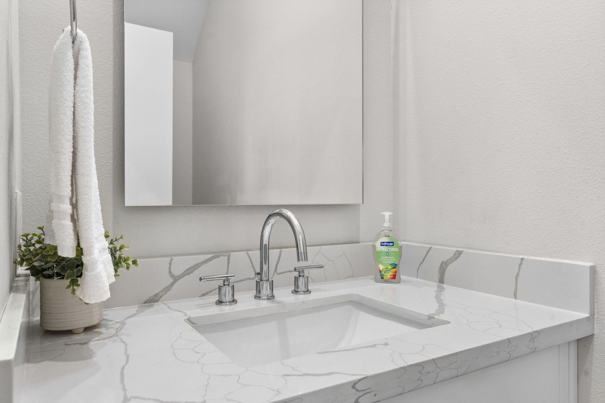 851 Prosper Street Houston, TX 77088 - Photo 28 of 50 a bathroom with a sink and a mirror