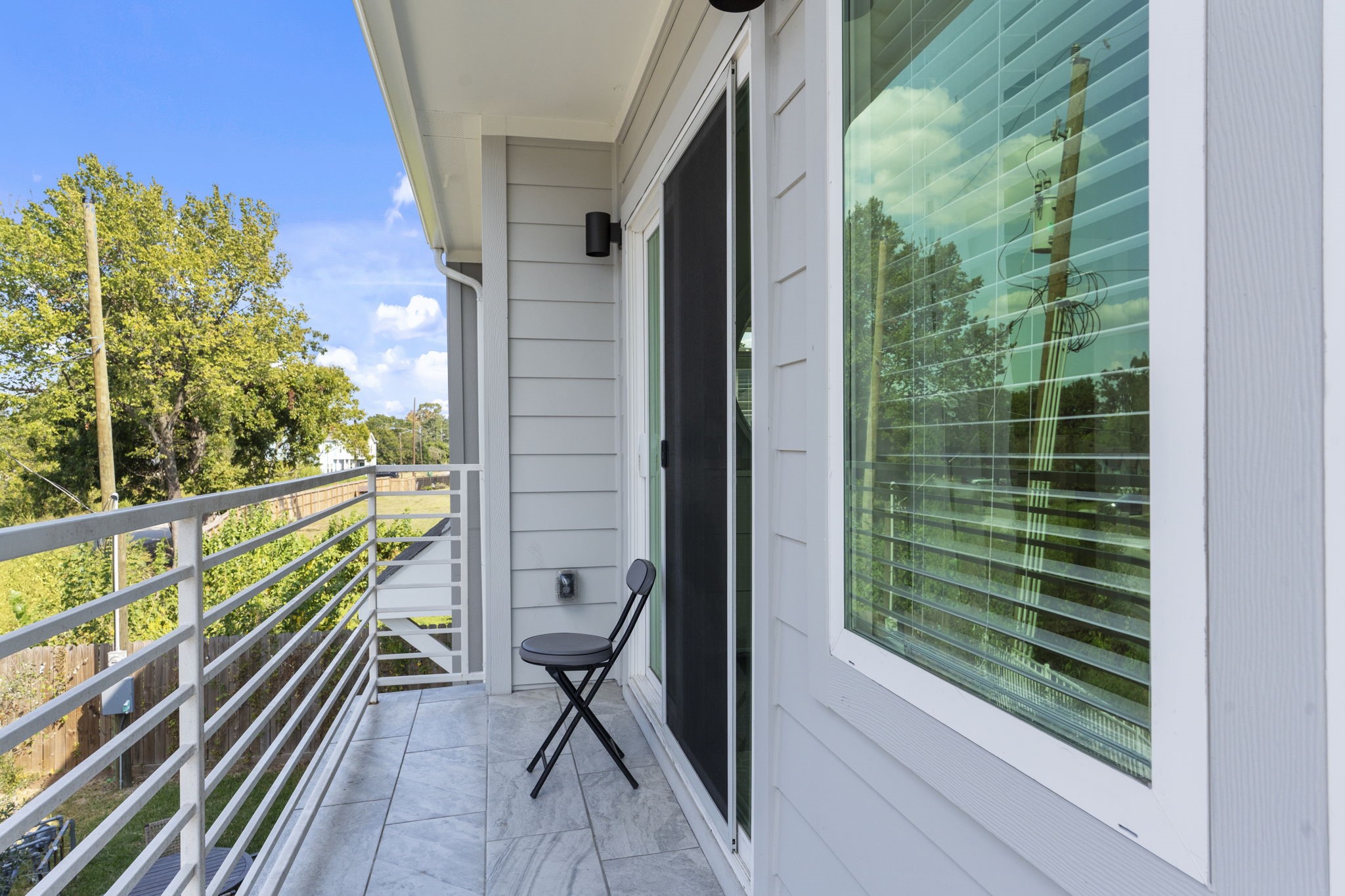 851 Prosper Street Houston, TX 77088 - Photo 38 of 50 a view of balcony with wooden floor