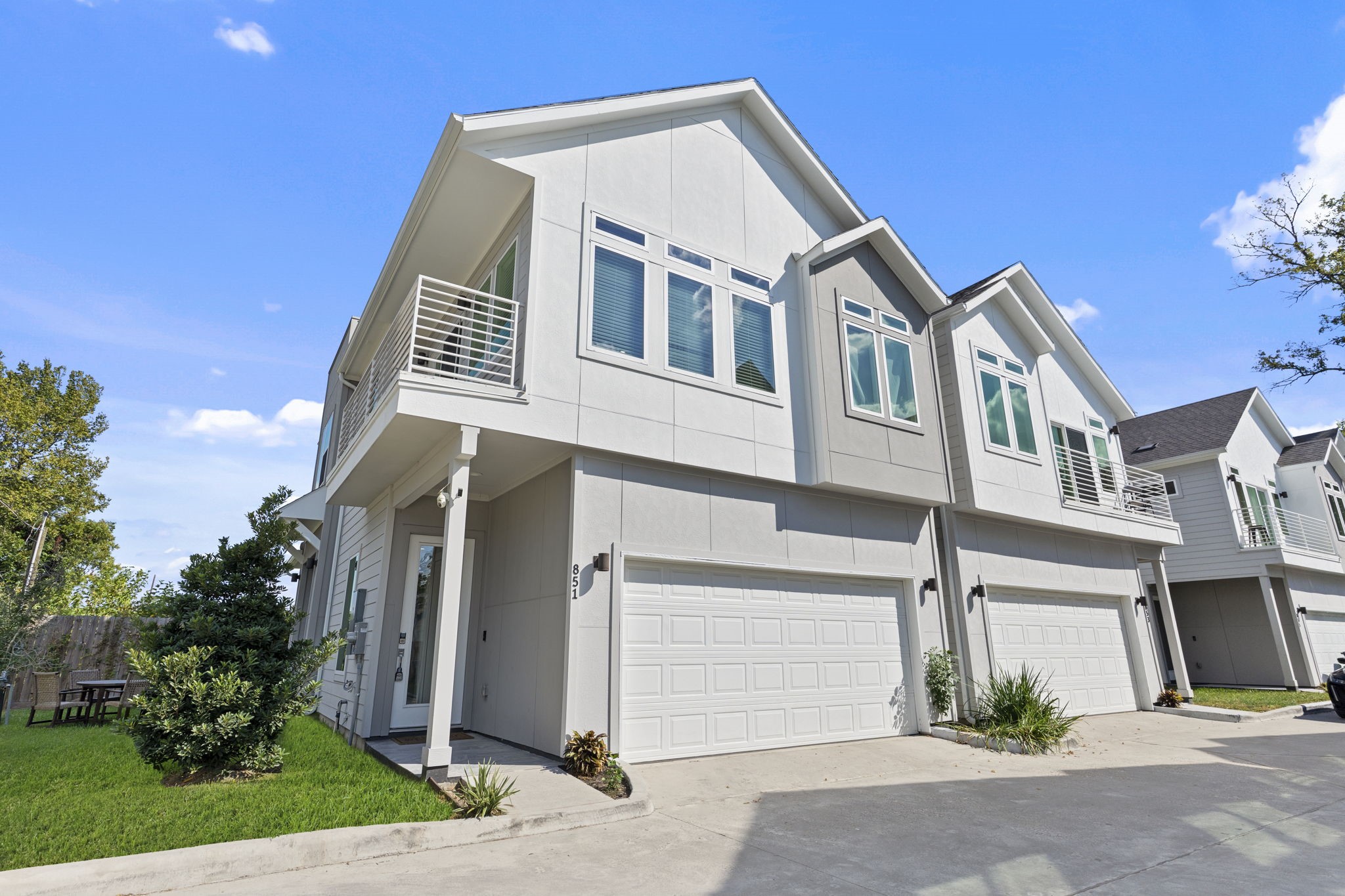 851 Prosper Street Houston, TX 77088 - Photo 7 of 50 a front view of a house with a yard