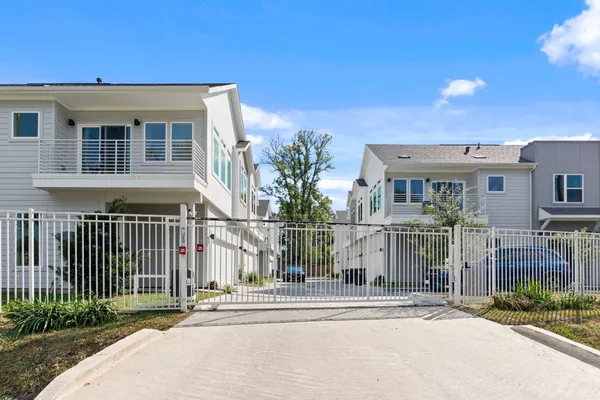 a view of a building with a street