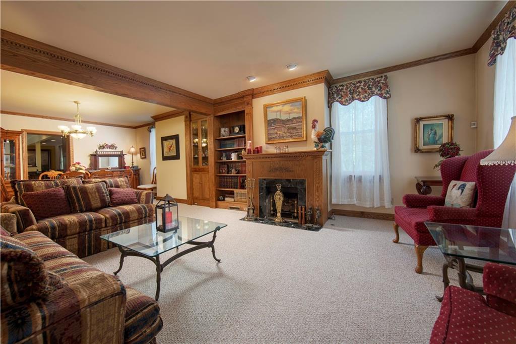 525 Great Belt Road Butler, PA 16002 - Photo 5 of 25 Formal Living Room with gas fireplace open to the Dining Room.