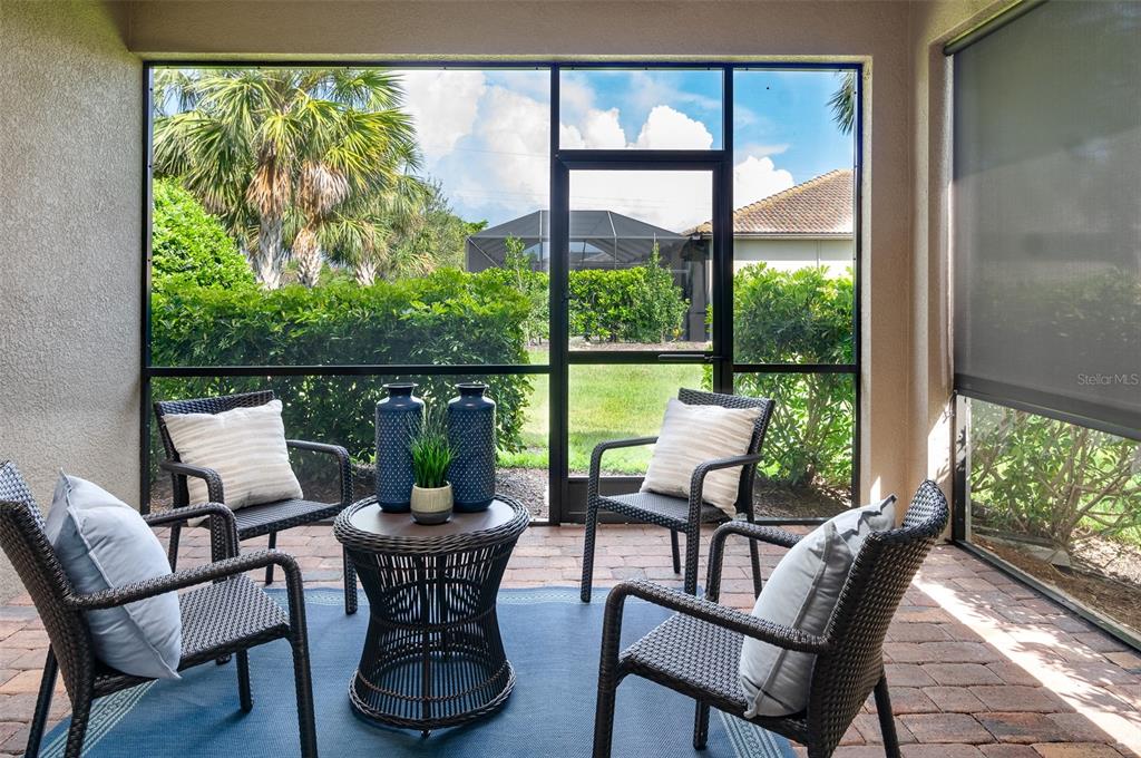 12209 Marsh Pointe Road Sarasota, FL 34238 - Photo 13 of 42 Screened Lanai with Sun Control Shade