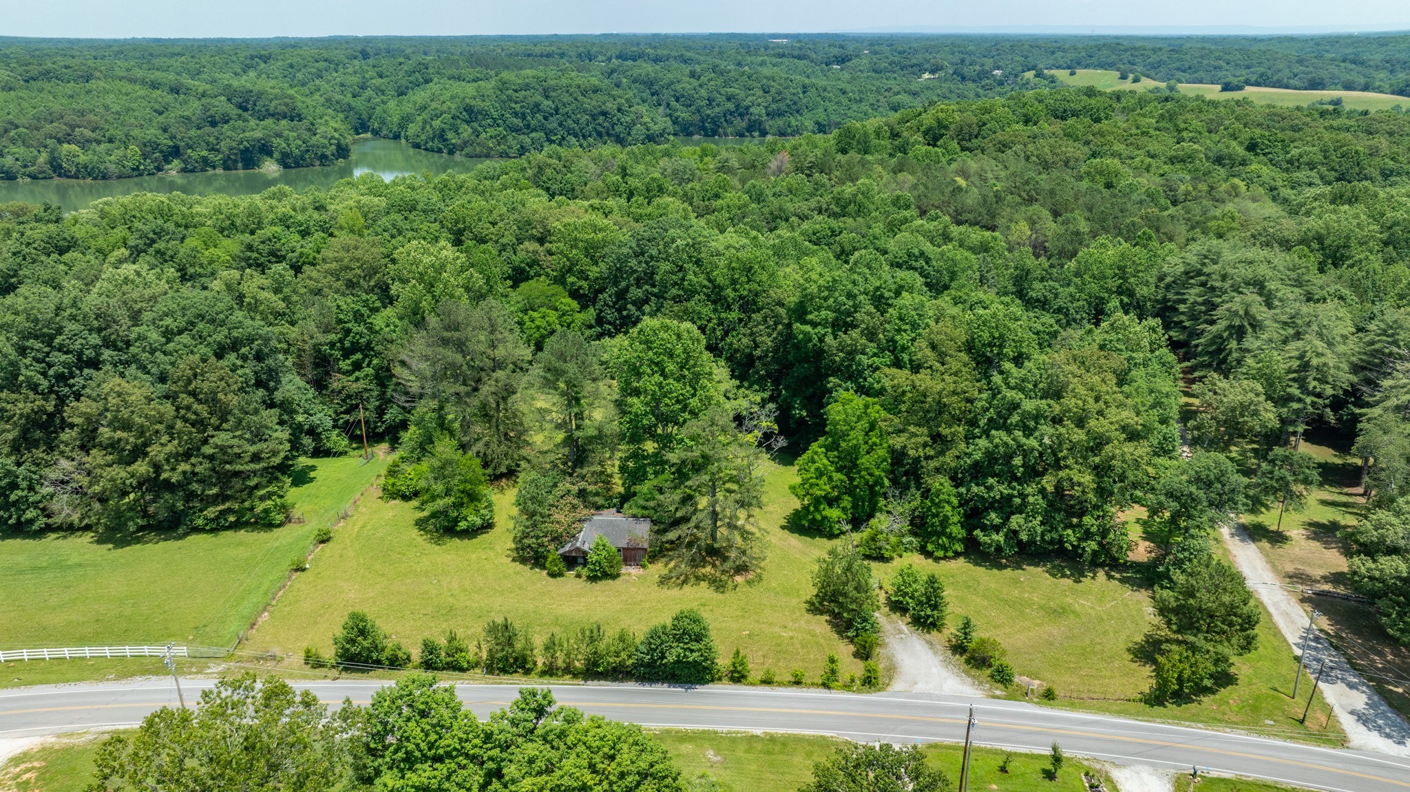 7542 Chestnut Ridge Road Winchester, TN 37398 - Photo 15 of 40 an aerial view of residential houses with outdoor space and street view