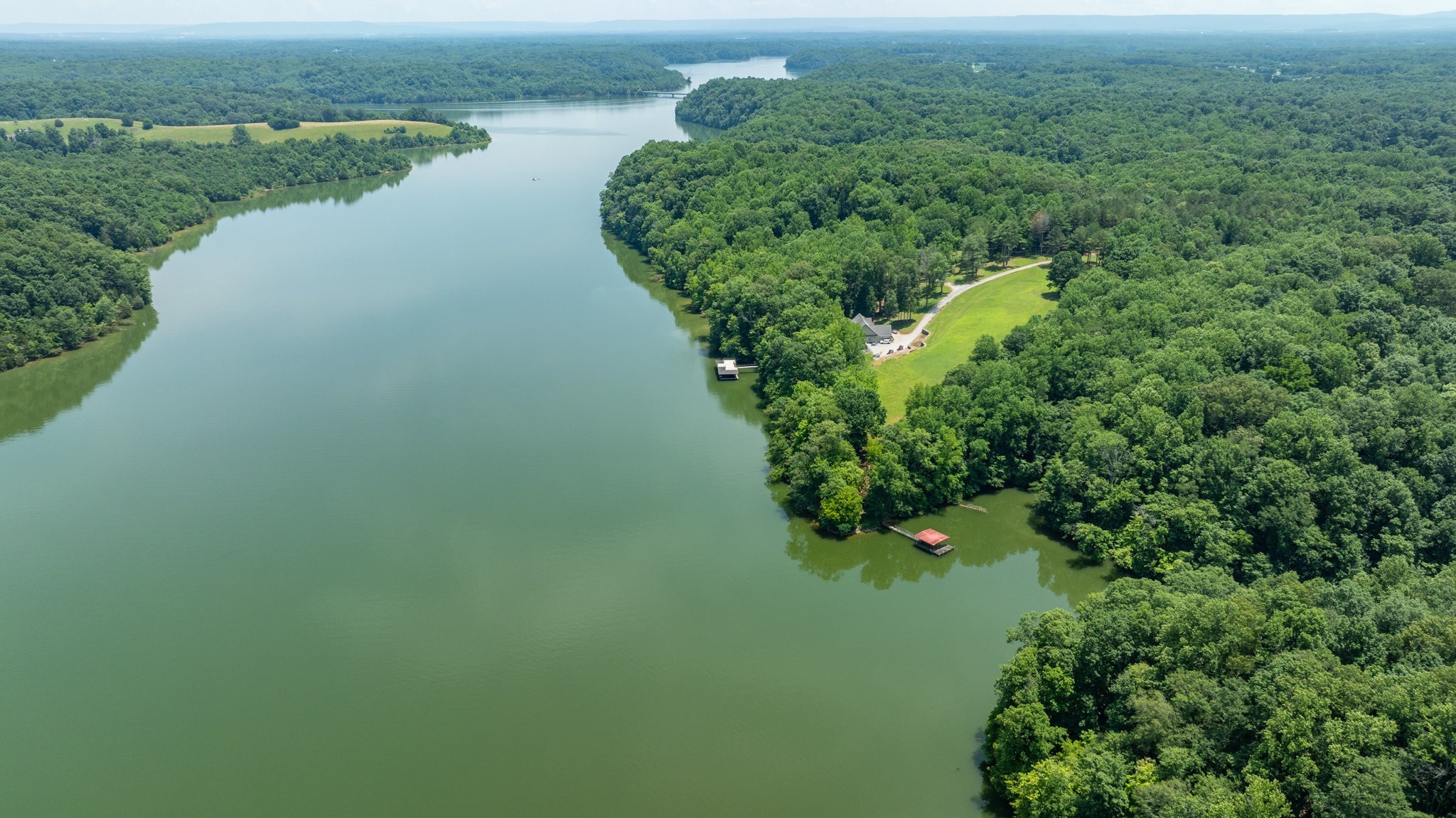 7542 Chestnut Ridge Road Winchester, TN 37398 - Photo 22 of 40 a view of a lake with a park