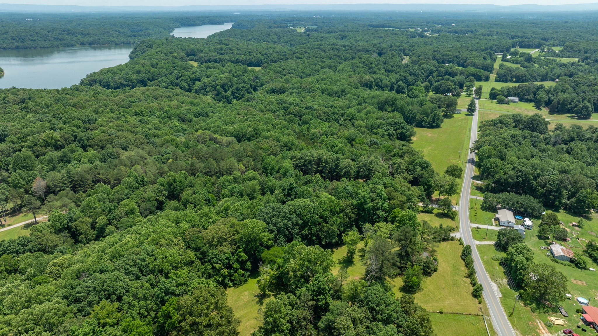 7542 Chestnut Ridge Road Winchester, TN 37398 - Photo 27 of 40 an aerial view of residential house with outdoor space and trees all around