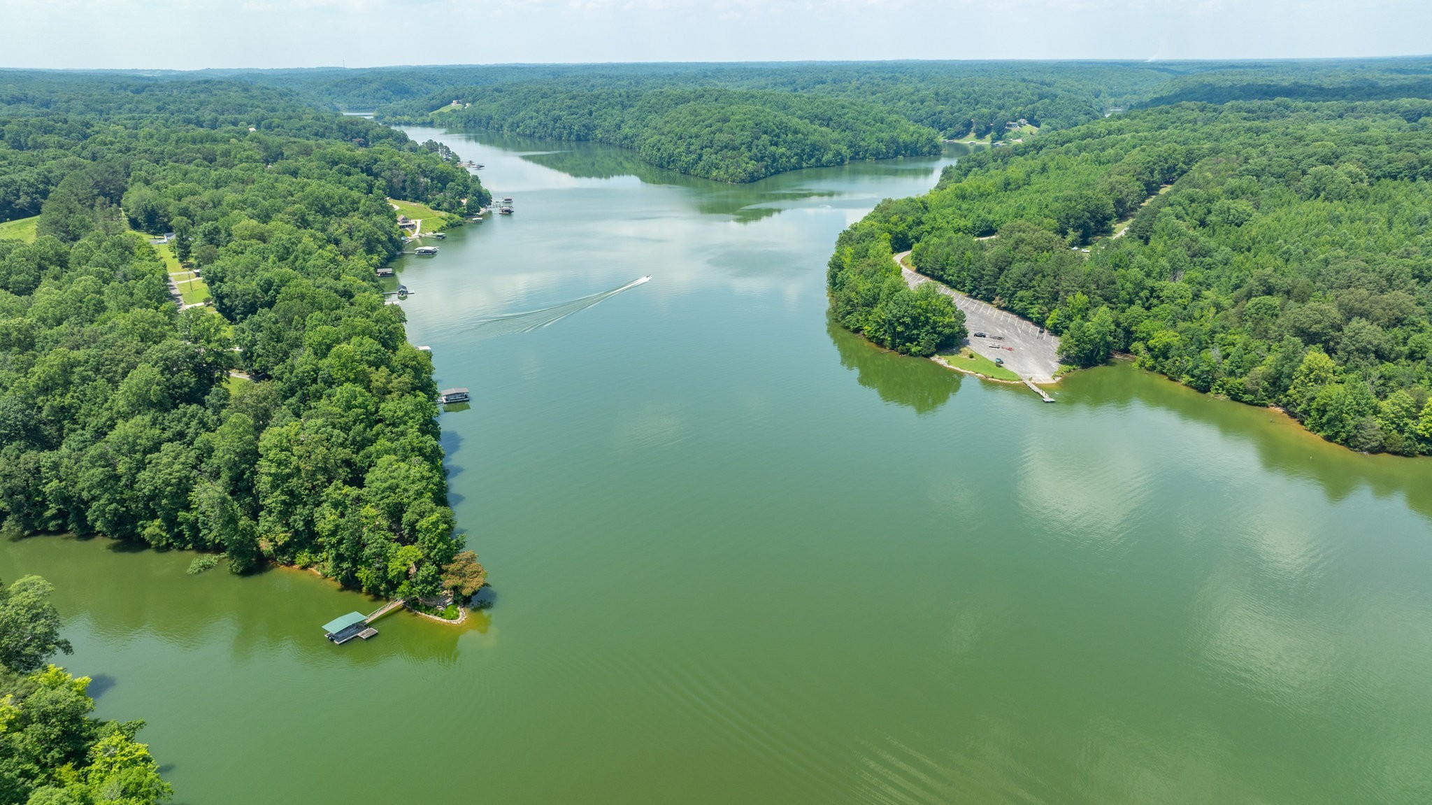 7542 Chestnut Ridge Road Winchester, TN 37398 - Photo 33 of 40 a view of a lake with a forest