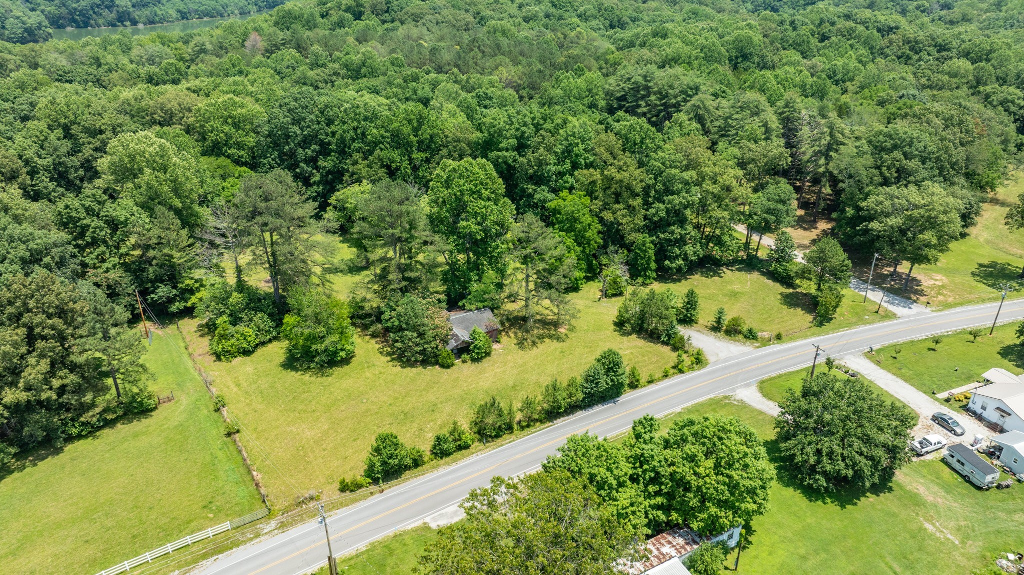 7542 Chestnut Ridge Road Winchester, TN 37398 - Photo 36 of 40 a view of a yard with a tree
