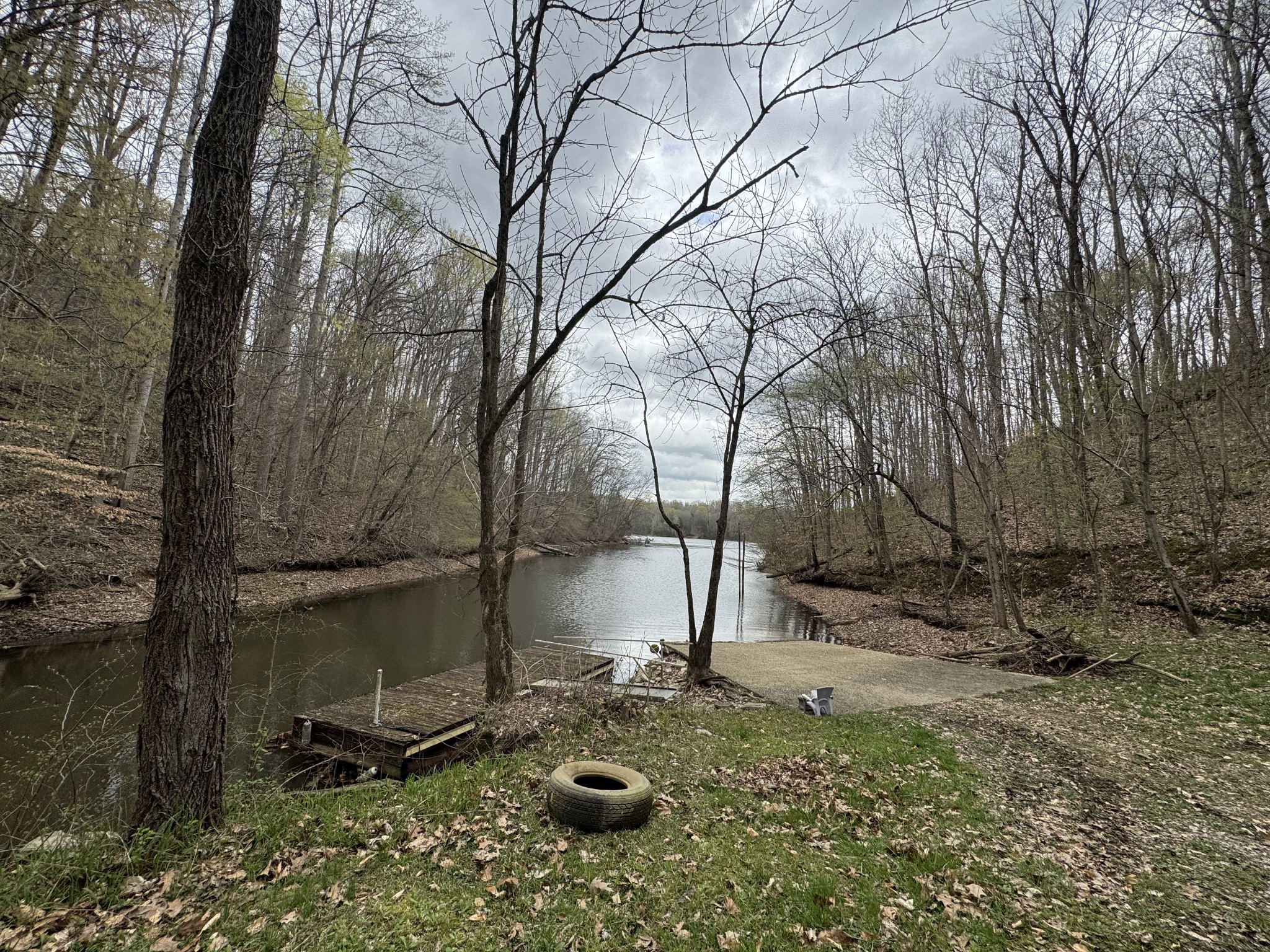 7542 Chestnut Ridge Road Winchester, TN 37398 - Photo 38 of 40 a backyard of a house with lots of green space and outdoor seating