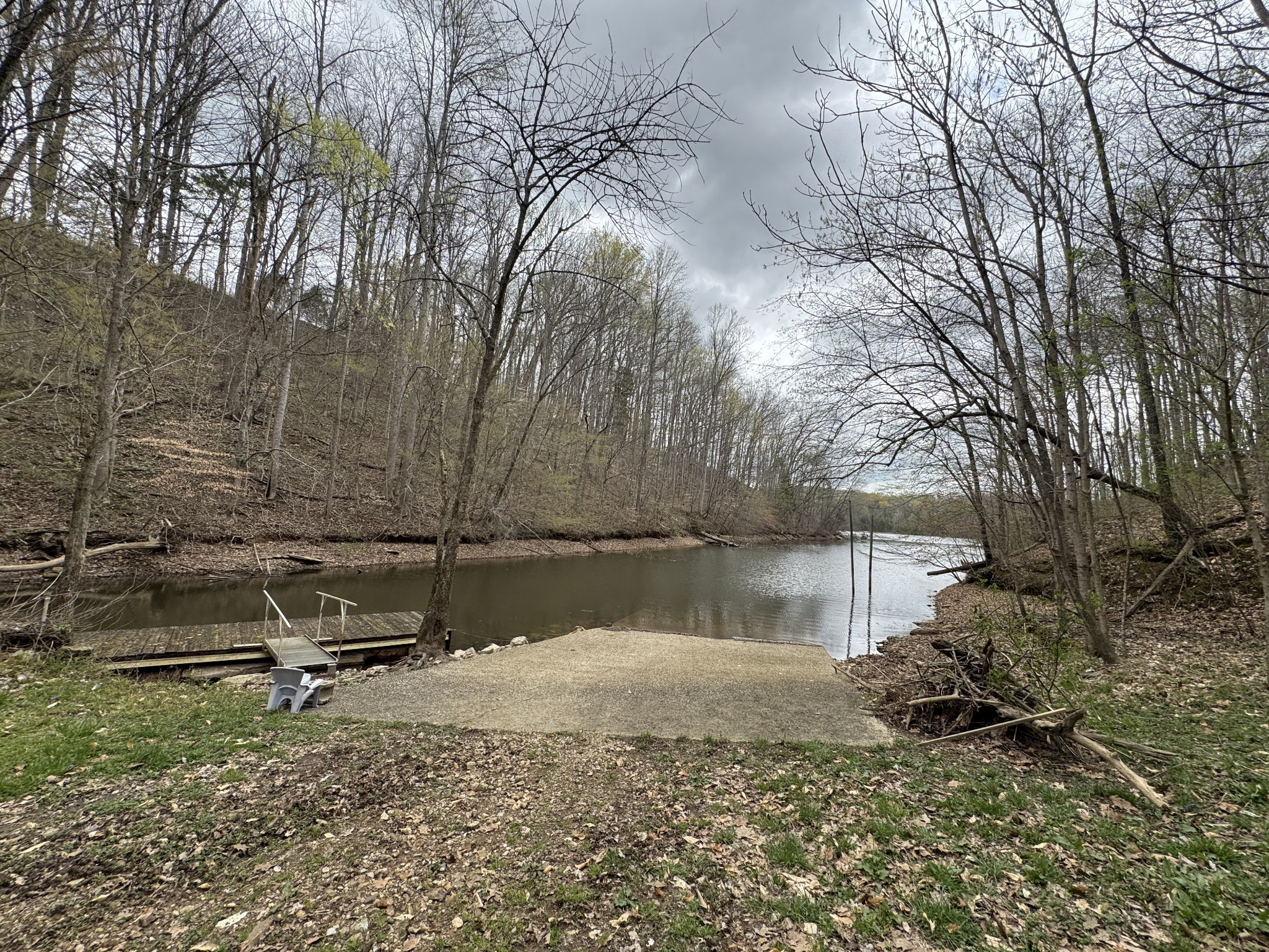 7542 Chestnut Ridge Road Winchester, TN 37398 - Photo 39 of 40 a backyard of a house with a yard and outdoor seating