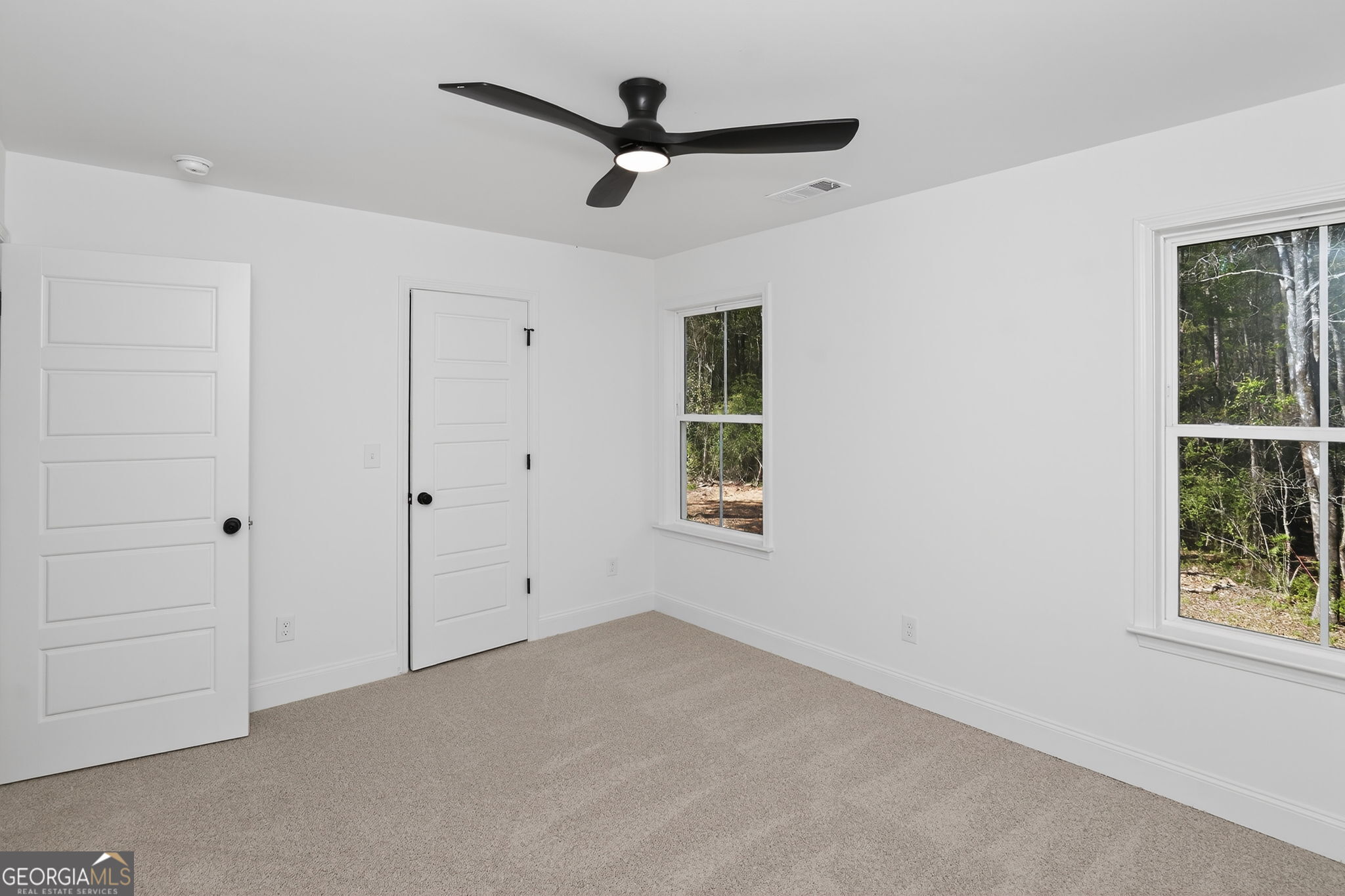 1229 Chappell Mill Road Jackson, GA 30233 - Photo 44 of 55 a view of an empty room with a window