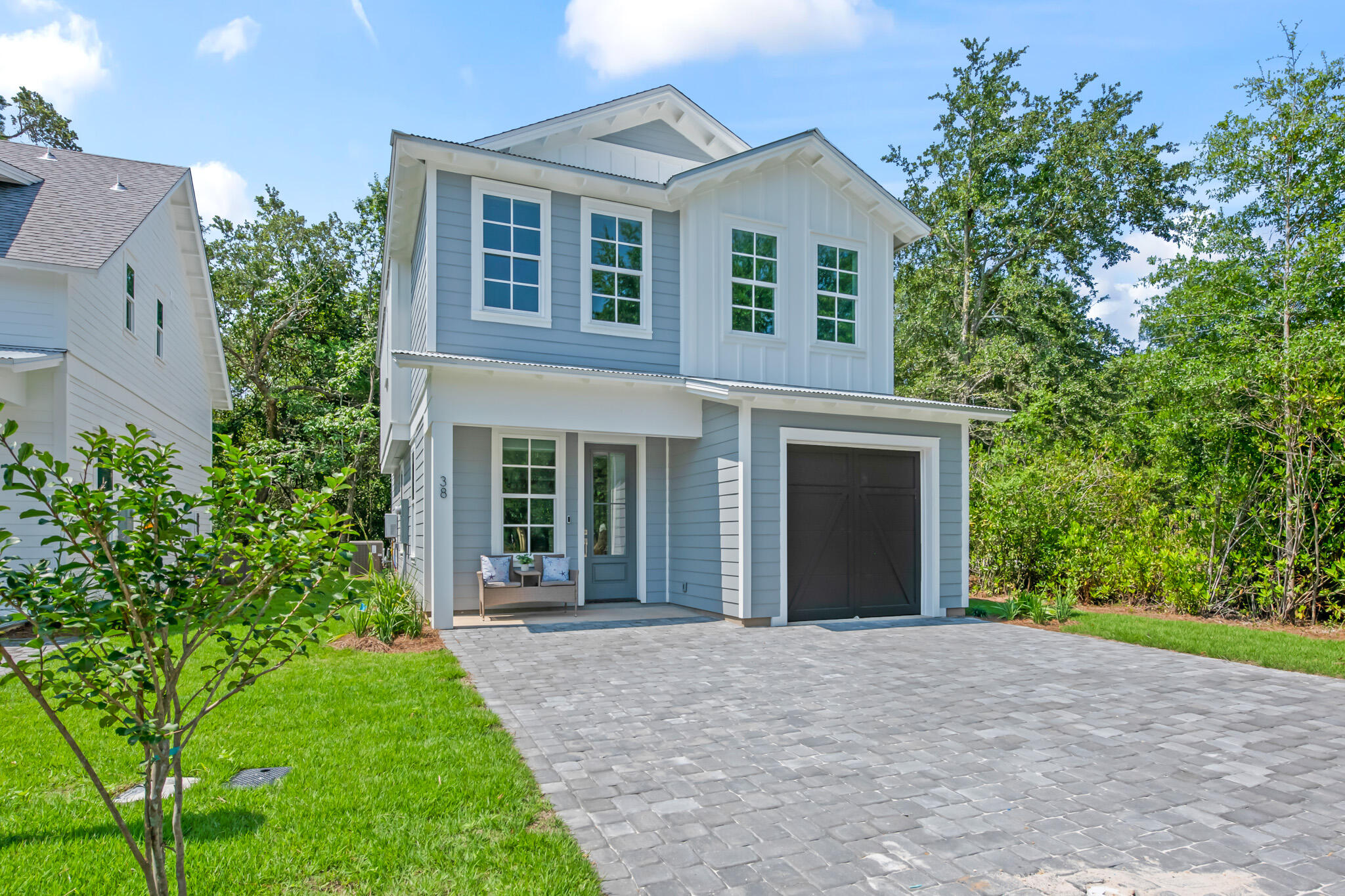 38 Rearden Way Santa Rosa Beach, FL 32459 - Photo 1 of 38 front view of a house with a yard and an trees