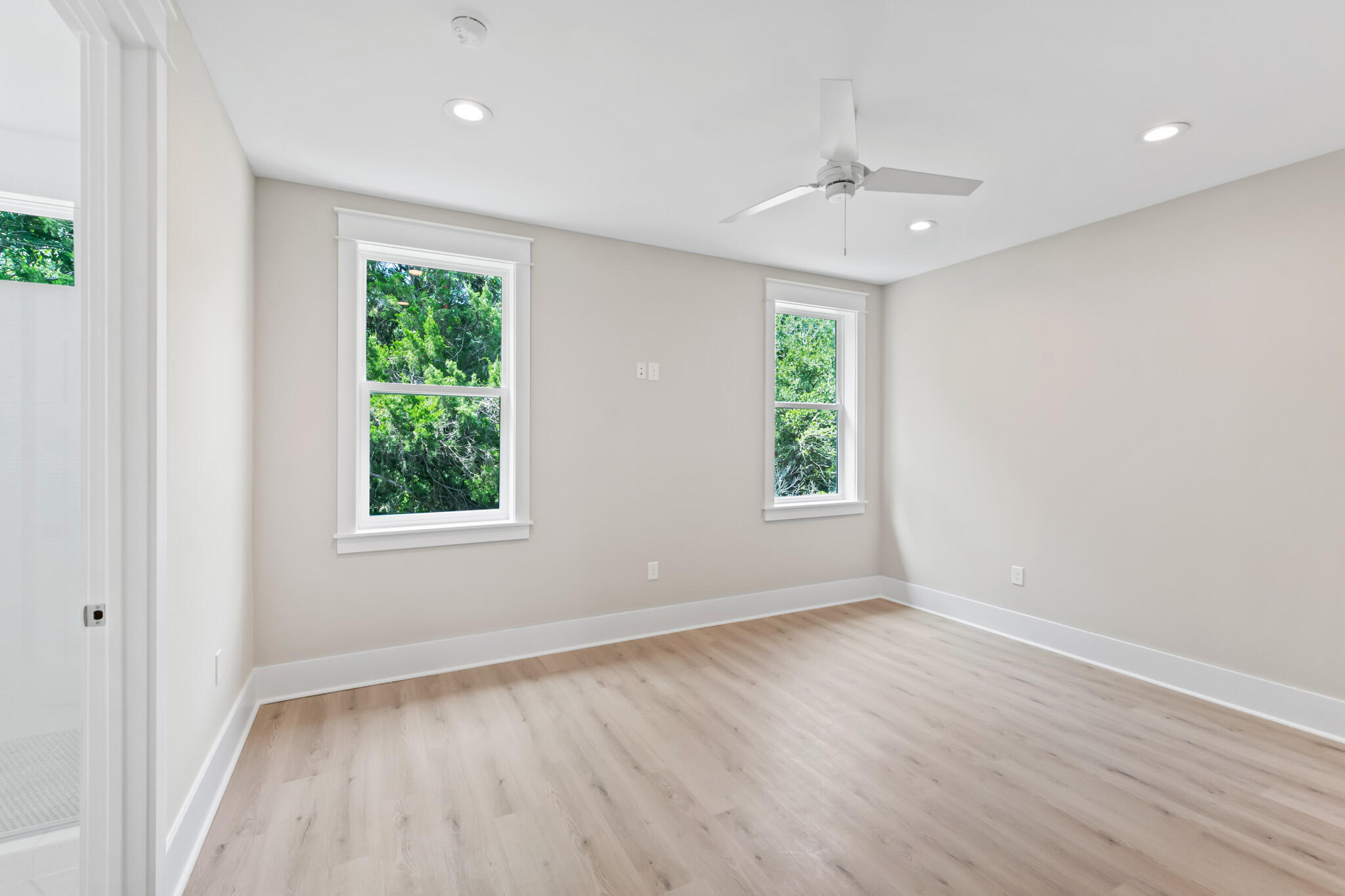 38 Rearden Way Santa Rosa Beach, FL 32459 - Photo 23 of 38 wooden floor in an empty room with a window