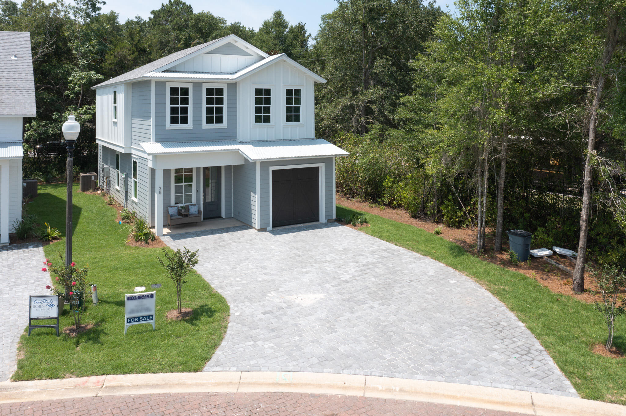 38 Rearden Way Santa Rosa Beach, FL 32459 - Photo 7 of 38 a aerial view of a house with a yard and potted plants