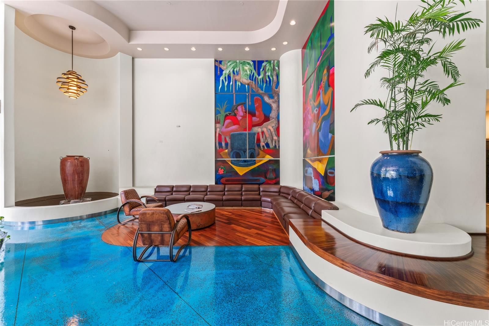 700 Richards Street, Unit 1709 Honolulu, HI 96813 - Photo 21 of 25 a living room with furniture and flowers
