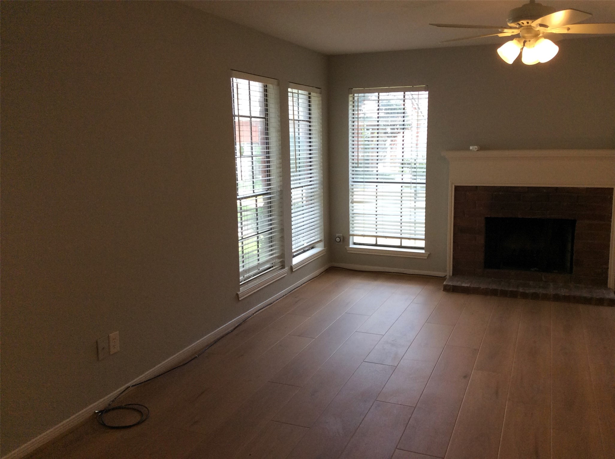2211 South Kirkwood Road, Unit 22 Houston, TX 77077 - Photo 4 of 25 Living Room with Fireplace