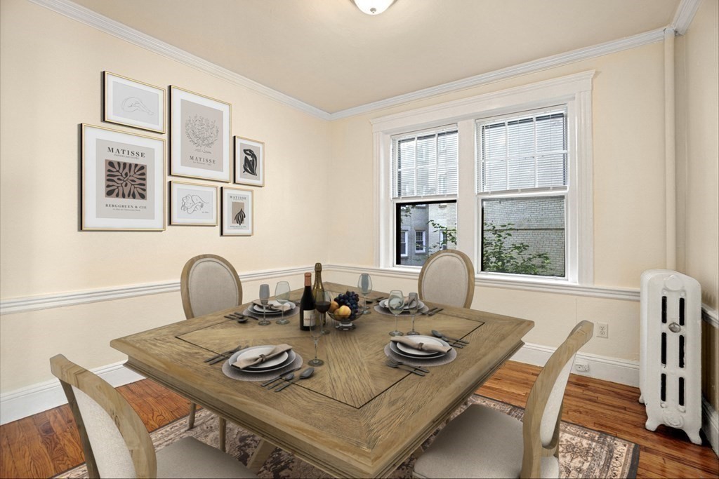 55 Lanark Road, Unit 6 Boston, MA 02135 - Photo 3 of 12 a view of a dining room and a table or chairs in a room