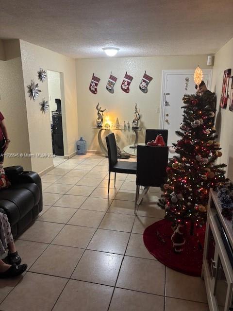 666 West 81st Street, Unit 418 Hialeah, FL 33014 - Photo 3 of 9 a living room with furniture and flowers