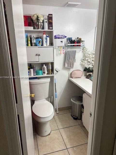 666 West 81st Street, Unit 418 Hialeah, FL 33014 - Photo 9 of 9 a bathroom with a toilet and a sink