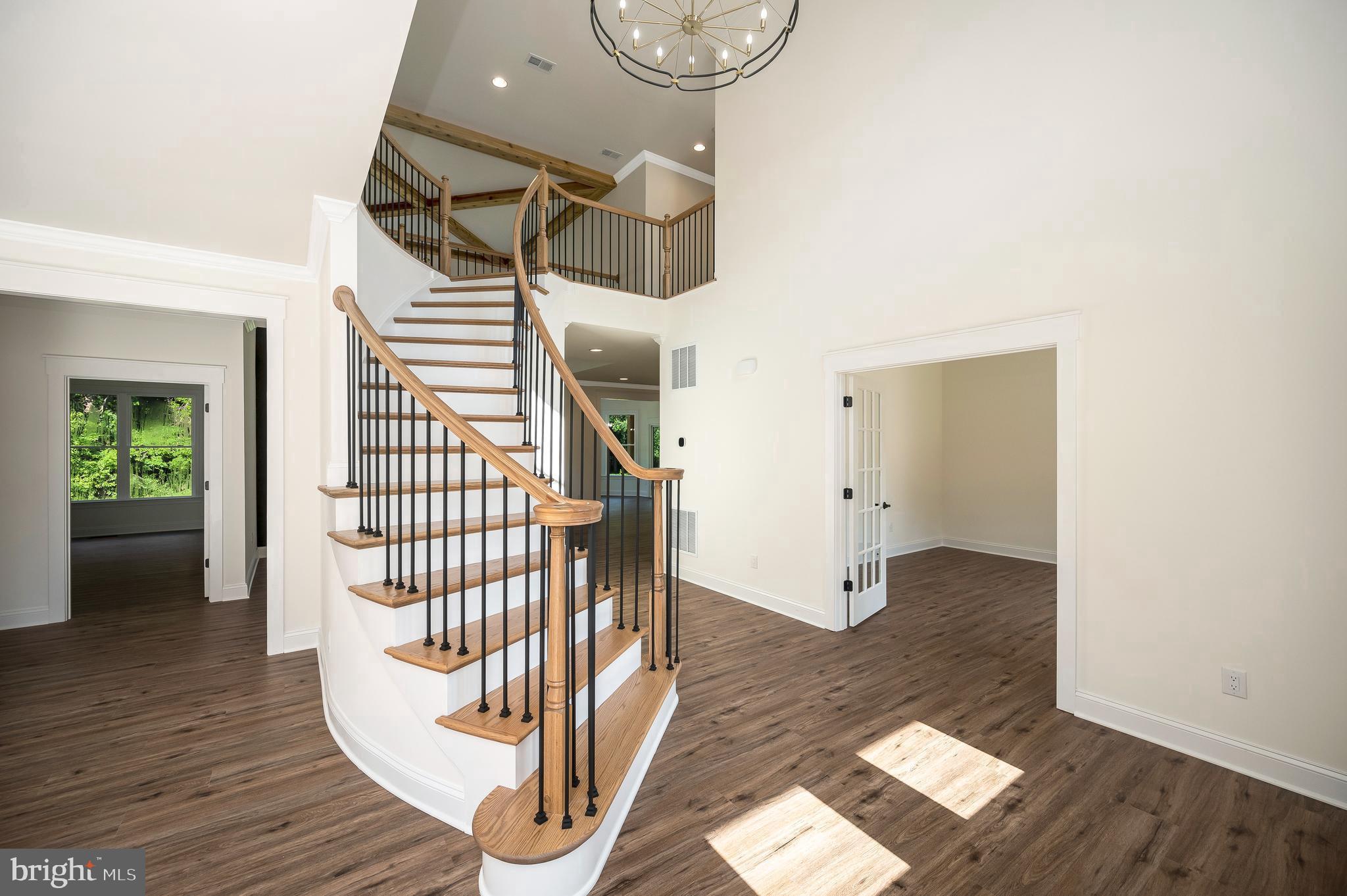 13208 Bristow Road Nokesville, VA 20181 - Photo 4 of 58 3 sets of oak stairs -foyer- rear- to lower level