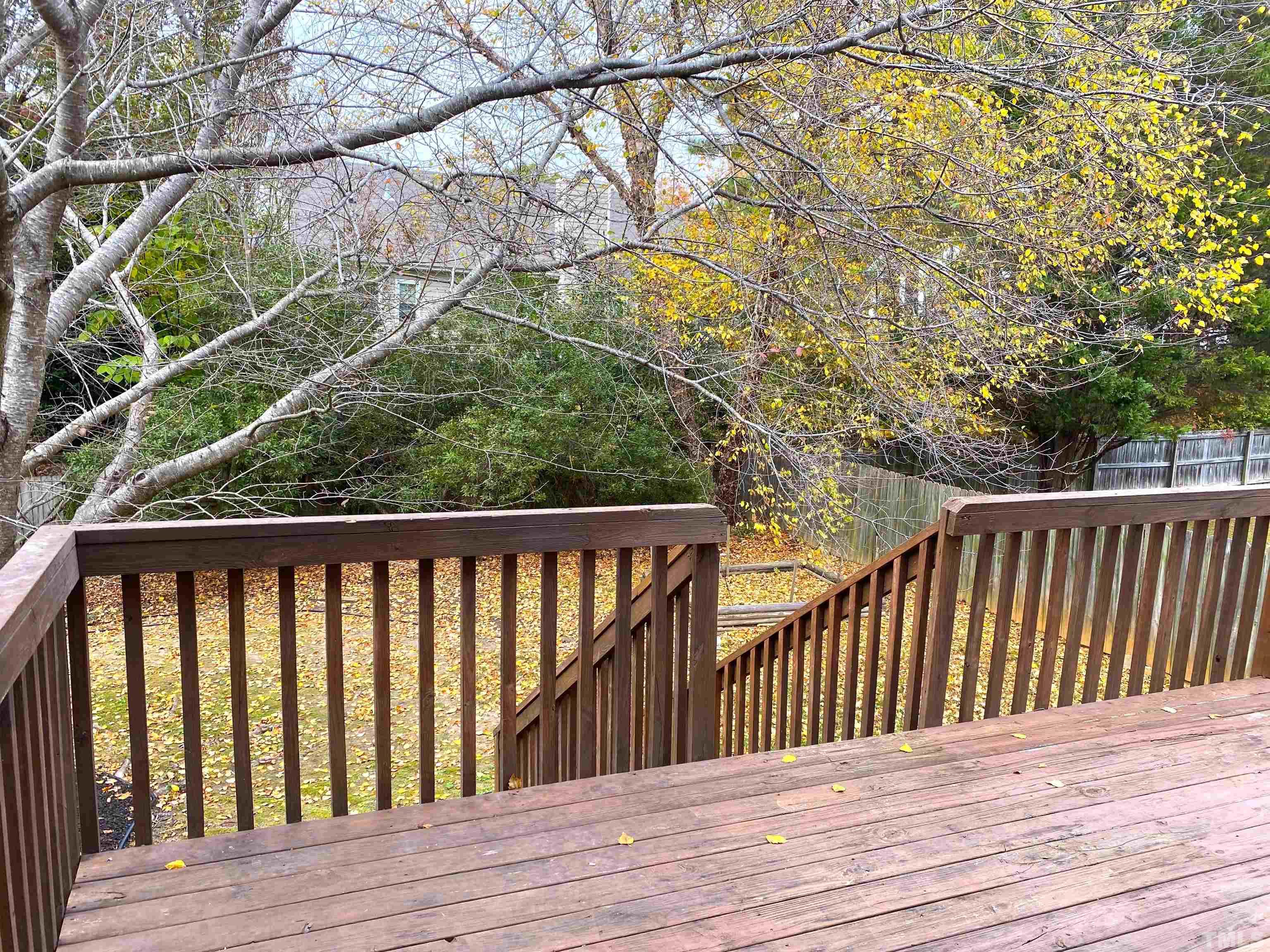 4313 Fowler Ridge Drive Raleigh, NC 27616 - Photo 23 of 30 a balcony with wooden floor and fence