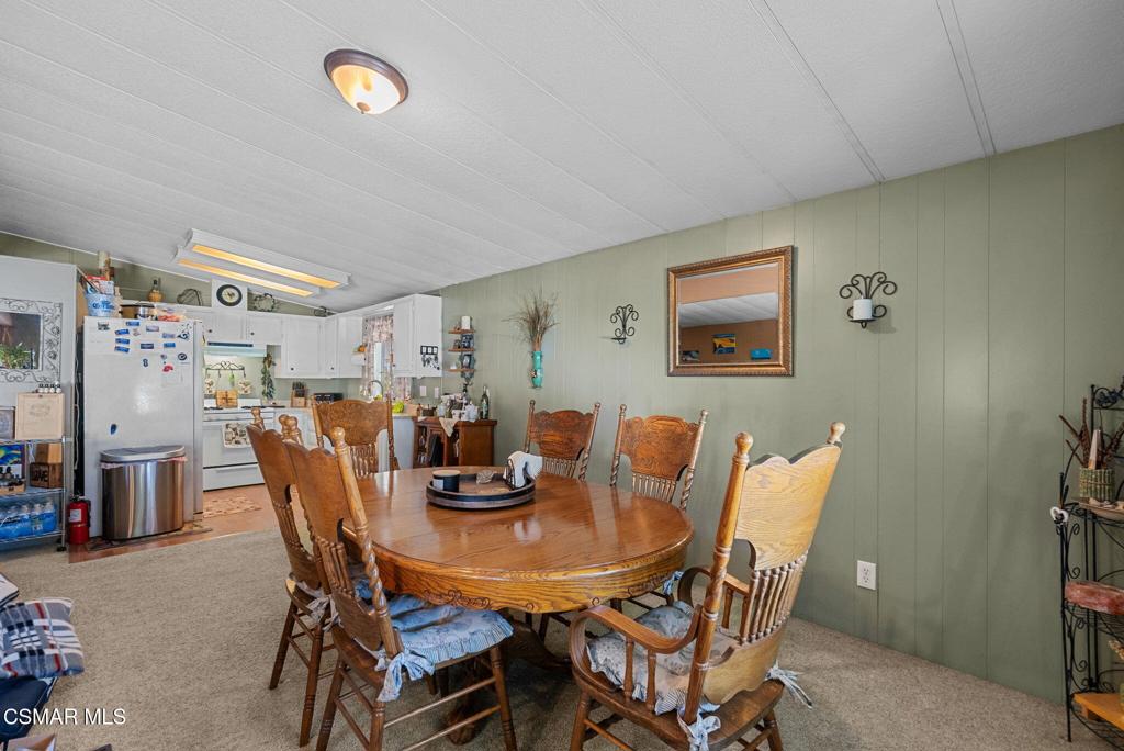 1550 Rory Lane, Unit 239 Simi Valley, CA 93063 - Photo 14 of 37 a view of a dining room with furniture