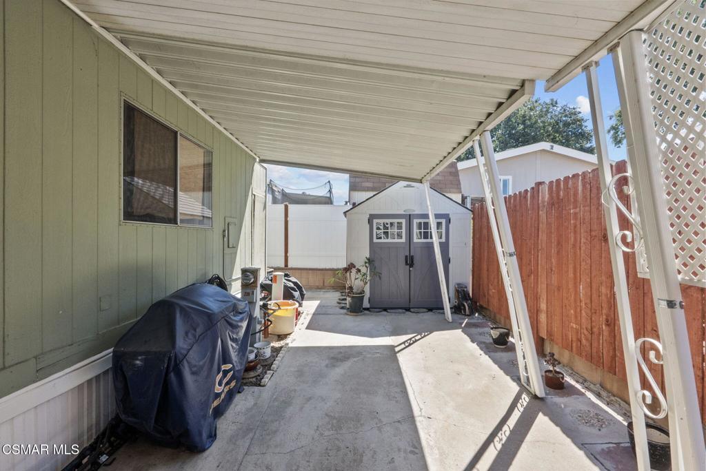 1550 Rory Lane, Unit 239 Simi Valley, CA 93063 - Photo 30 of 37 a balcony with furniture and window