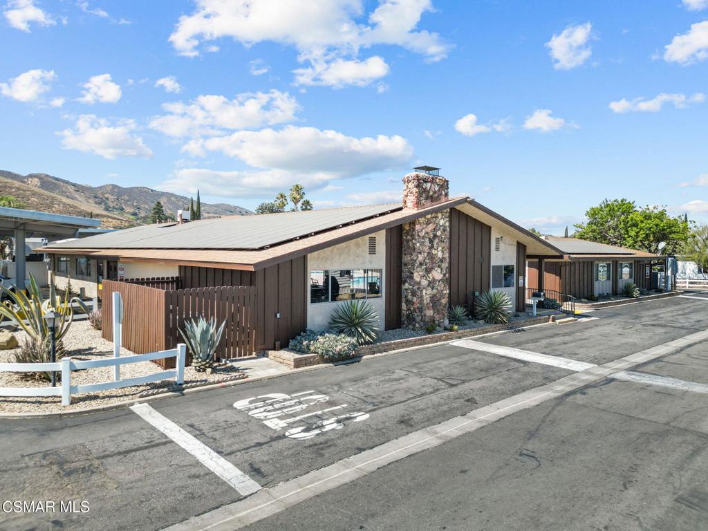 1550 Rory Lane, Unit 239 Simi Valley, CA 93063 - Photo 35 of 37 a front view of house with a garden