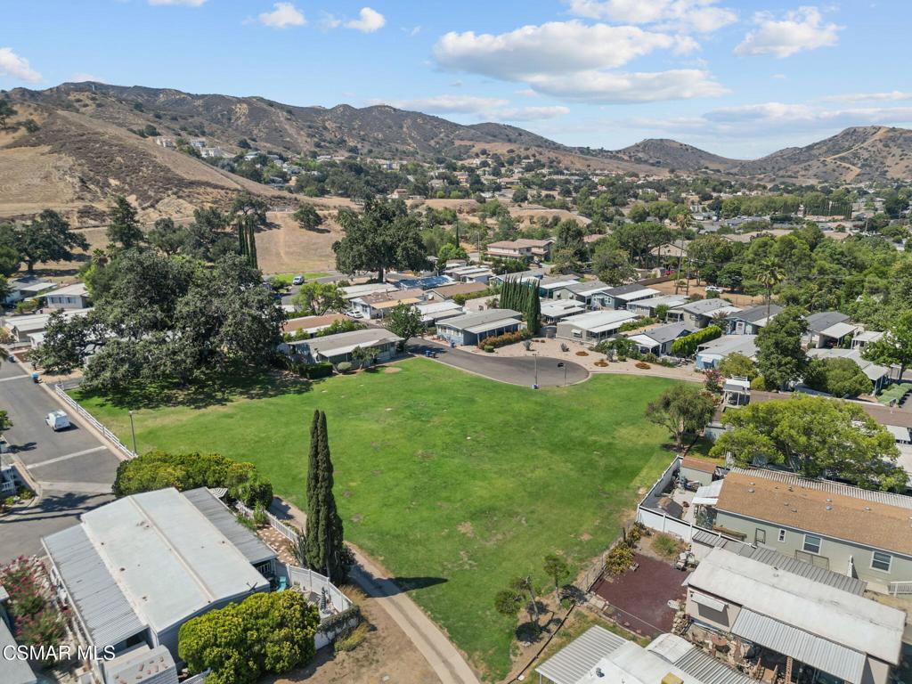 1550 Rory Lane, Unit 239 Simi Valley, CA 93063 - Photo 36 of 37 an aerial view of a house with mountain view