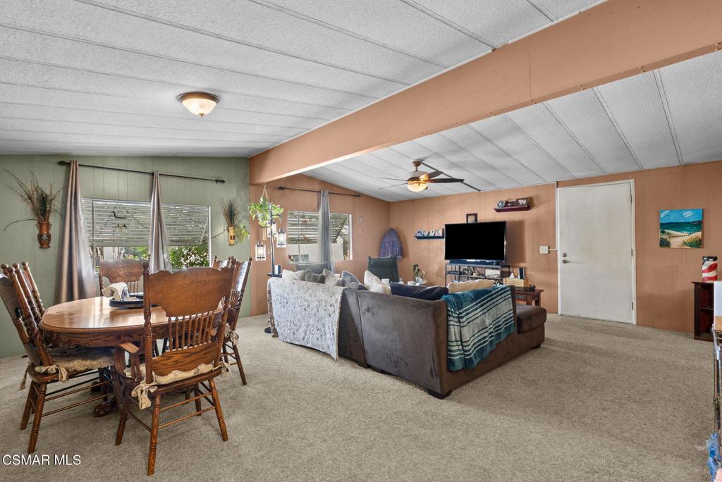 1550 Rory Lane, Unit 239 Simi Valley, CA 93063 - Photo 10 of 37 a living room with furniture and a flat screen tv