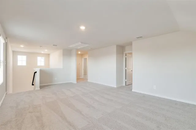 a view of a big room with a fireplace