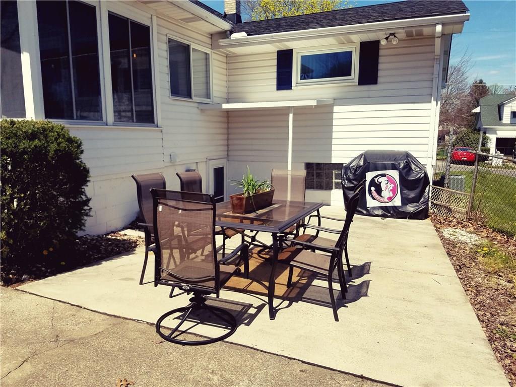 213 Linhurst Avenue Butler, PA 16001 - Photo 20 of 24 Large patio with plenty of room for entertaining by the in-ground pool.