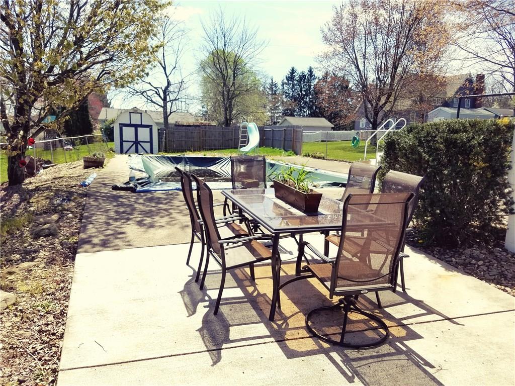 213 Linhurst Avenue Butler, PA 16001 - Photo 21 of 24 Large patio with plenty of room for entertaining by the in-ground pool.