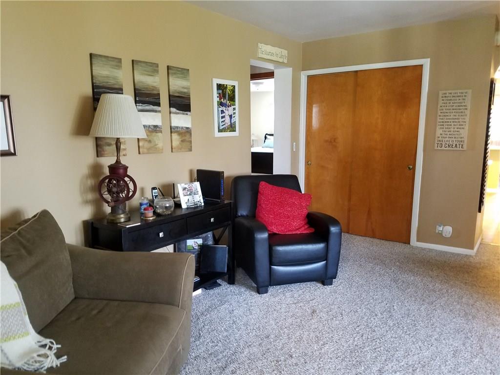 213 Linhurst Avenue Butler, PA 16001 - Photo 7 of 24 Large living room with plenty of seating and storage closet.