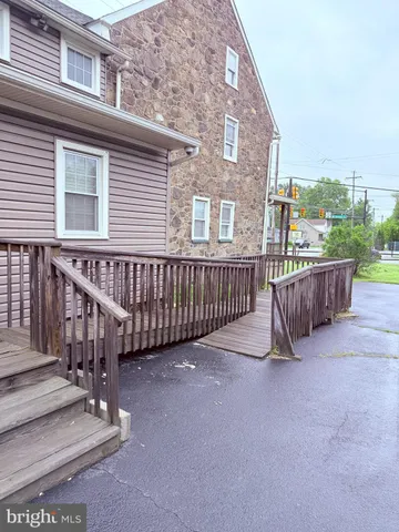 a view of a deck with a bench