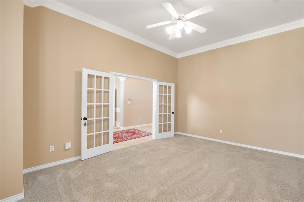 850 Turquoise Point Rockwall, TX 75032 - Photo 13 of 40 an empty room with windows and fan