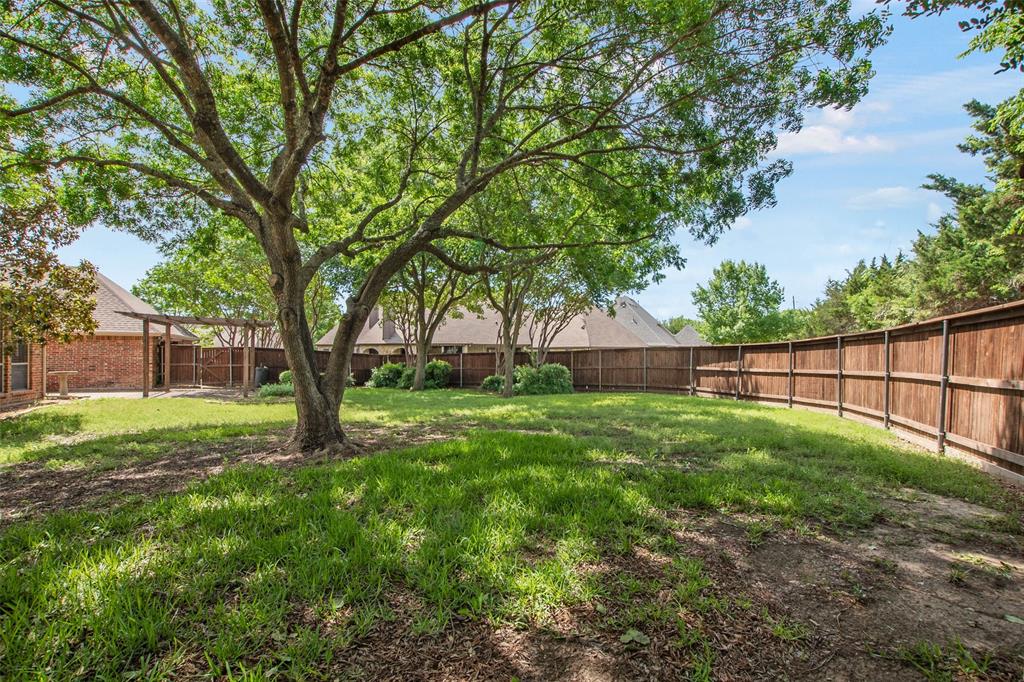 850 Turquoise Point Rockwall, TX 75032 - Photo 40 of 40 a view of backyard with green space